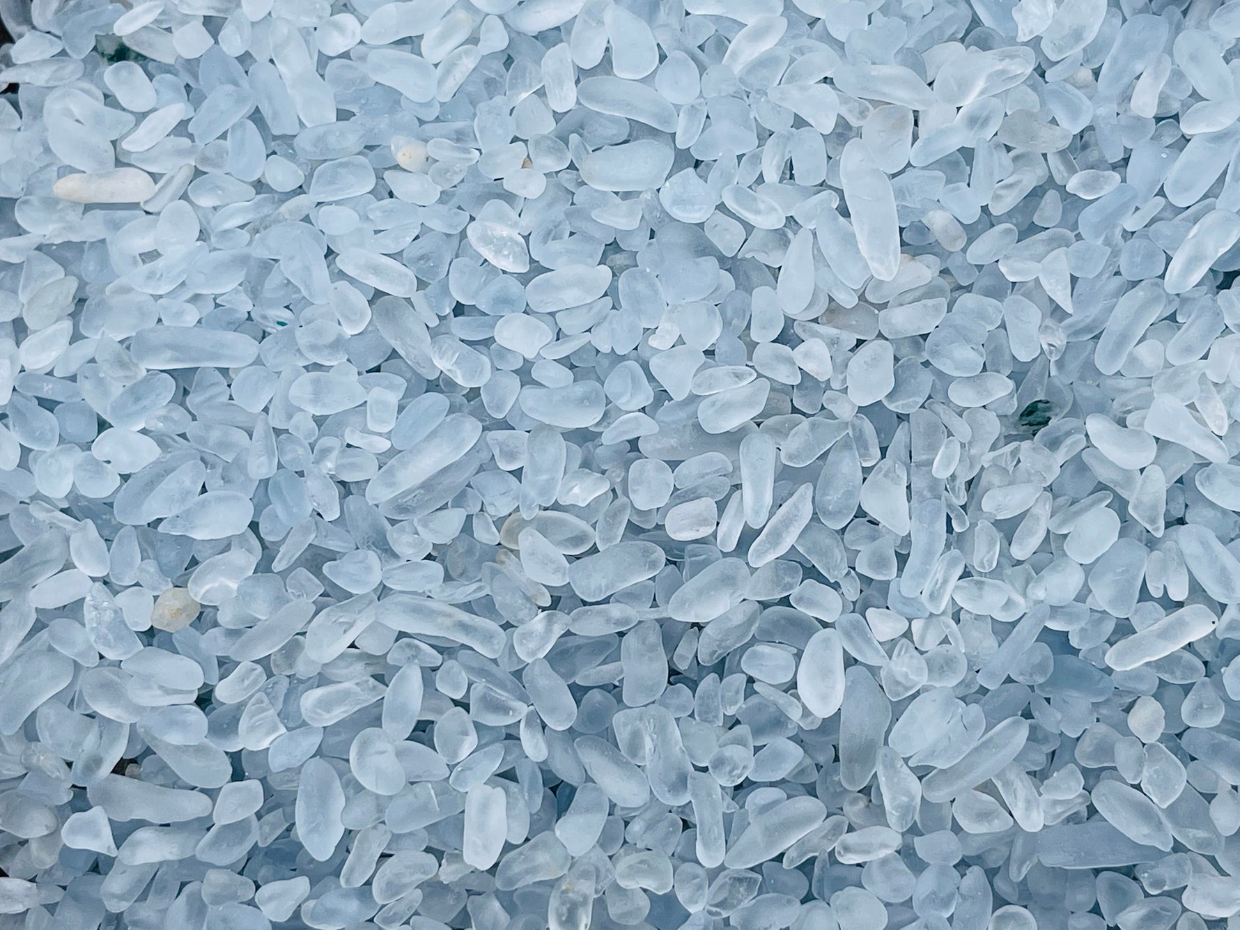 Semi-tumbled Celestite crystal chips in 2-6mm, natural gemstone stones from GemstoneGO for jewelry and healing applications.
