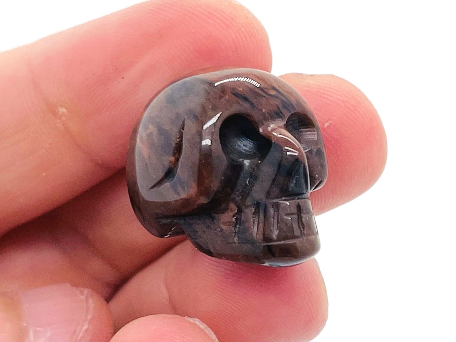 Mahogany Obsidian skull carved gemstone, 25mm, with detailed features and polished surface, from GemstoneGO.
