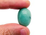 Aventurine tumbled stone by GemstoneGO, smooth green gemstone with natural variations and a polished finish.