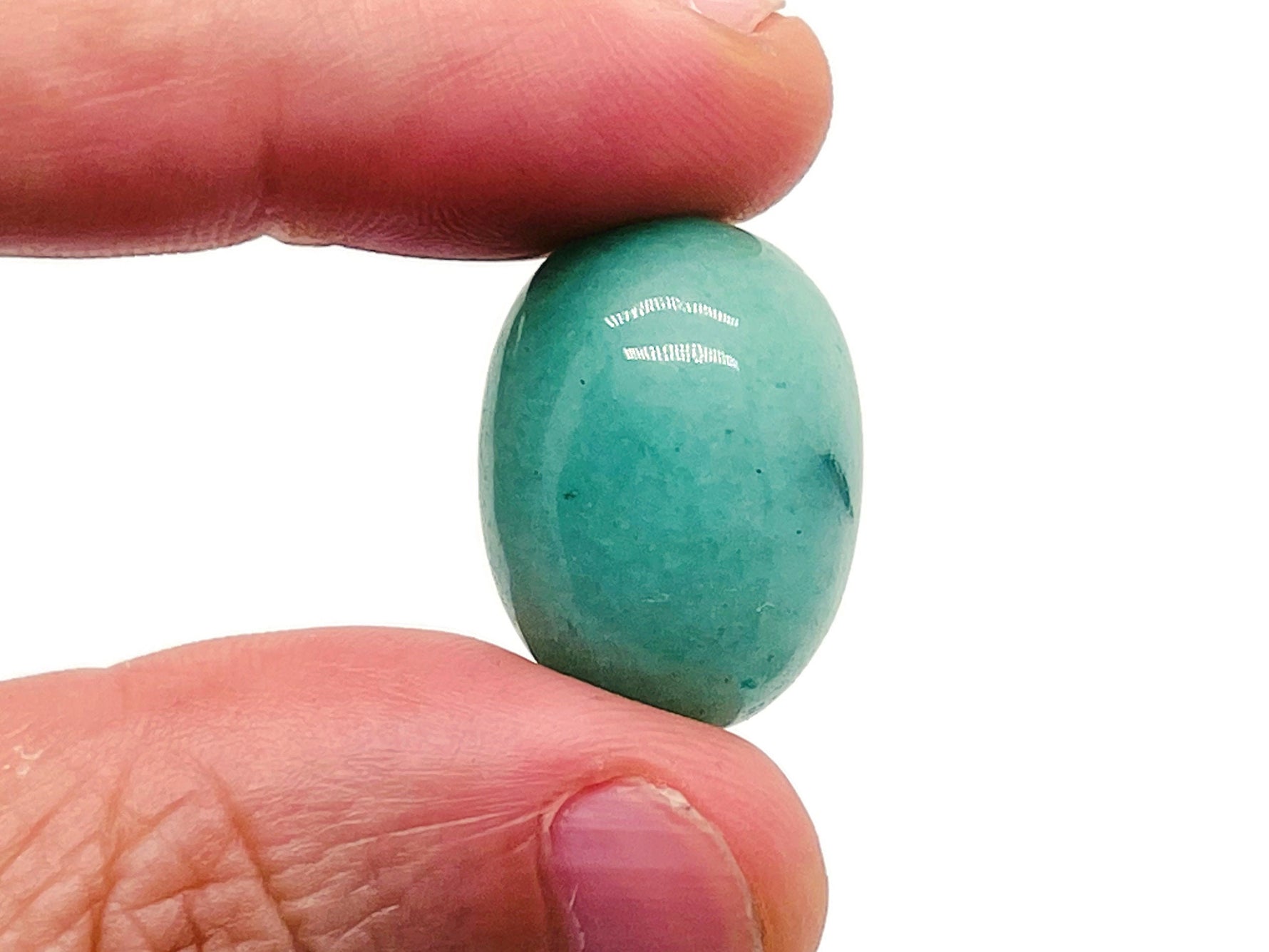 Aventurine tumbled stone by GemstoneGO, smooth green gemstone with natural variations and a polished finish.