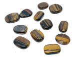 Tiger Eye flat gemstone slab from GemstoneGO, showcasing a polished, golden-brown crystal with chatoyancy and natural banding patterns.