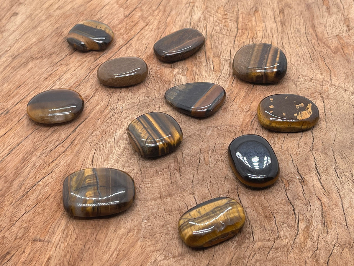 Tiger Eye flat gemstone slab from GemstoneGO showcasing its polished, golden-brown chatoyant surface and natural stone patterns.