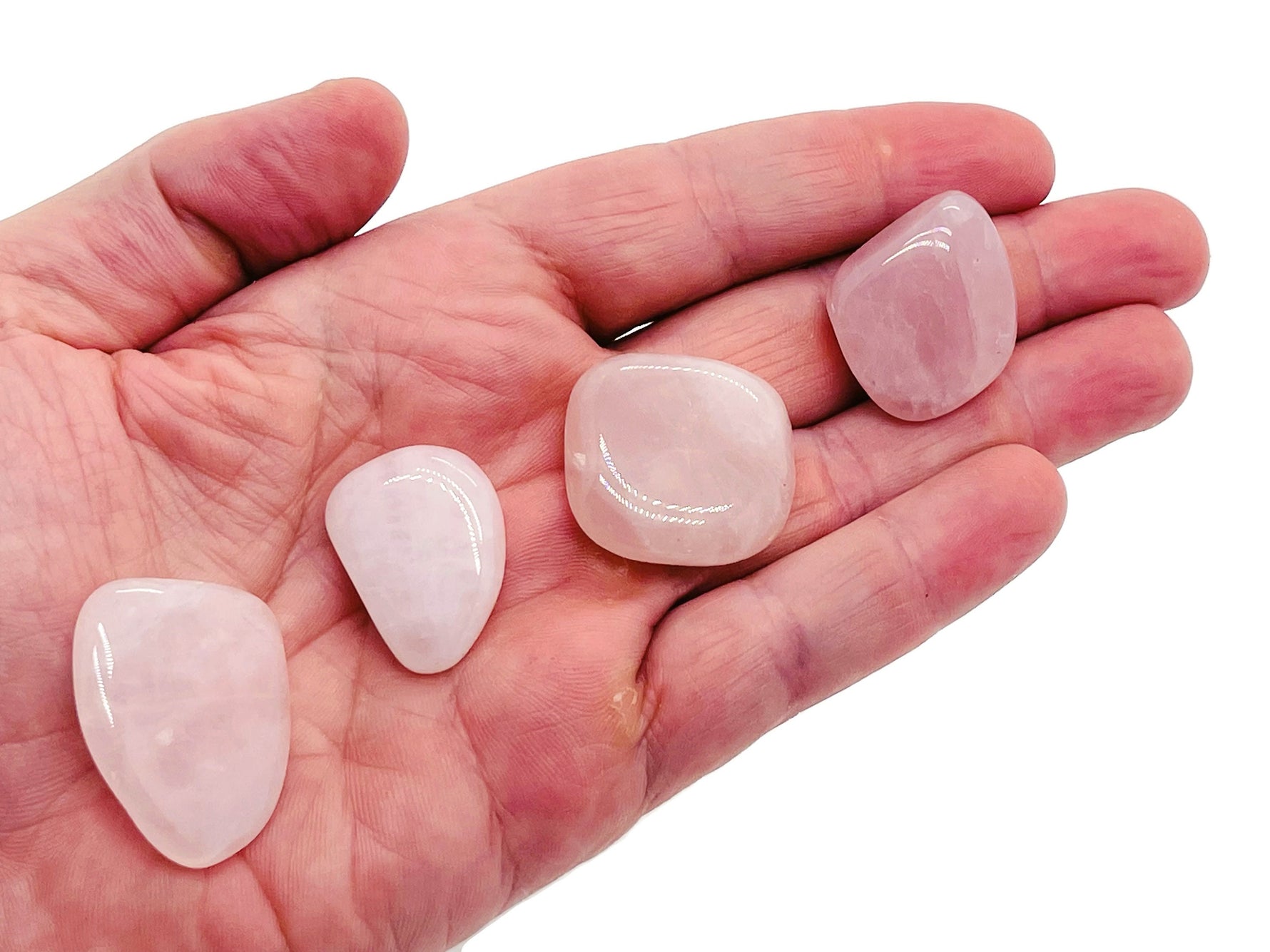 Rose Quartz flat gemstone slab from GemstoneGO, showcasing a smooth, polished pink crystal with natural stone patterns.