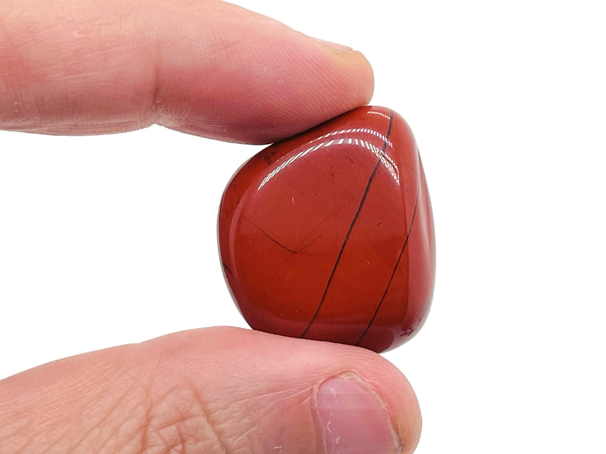 Red Jasper flat gemstone slab showing rich red color and natural stone texture, from GemstoneGO's crystal collection.