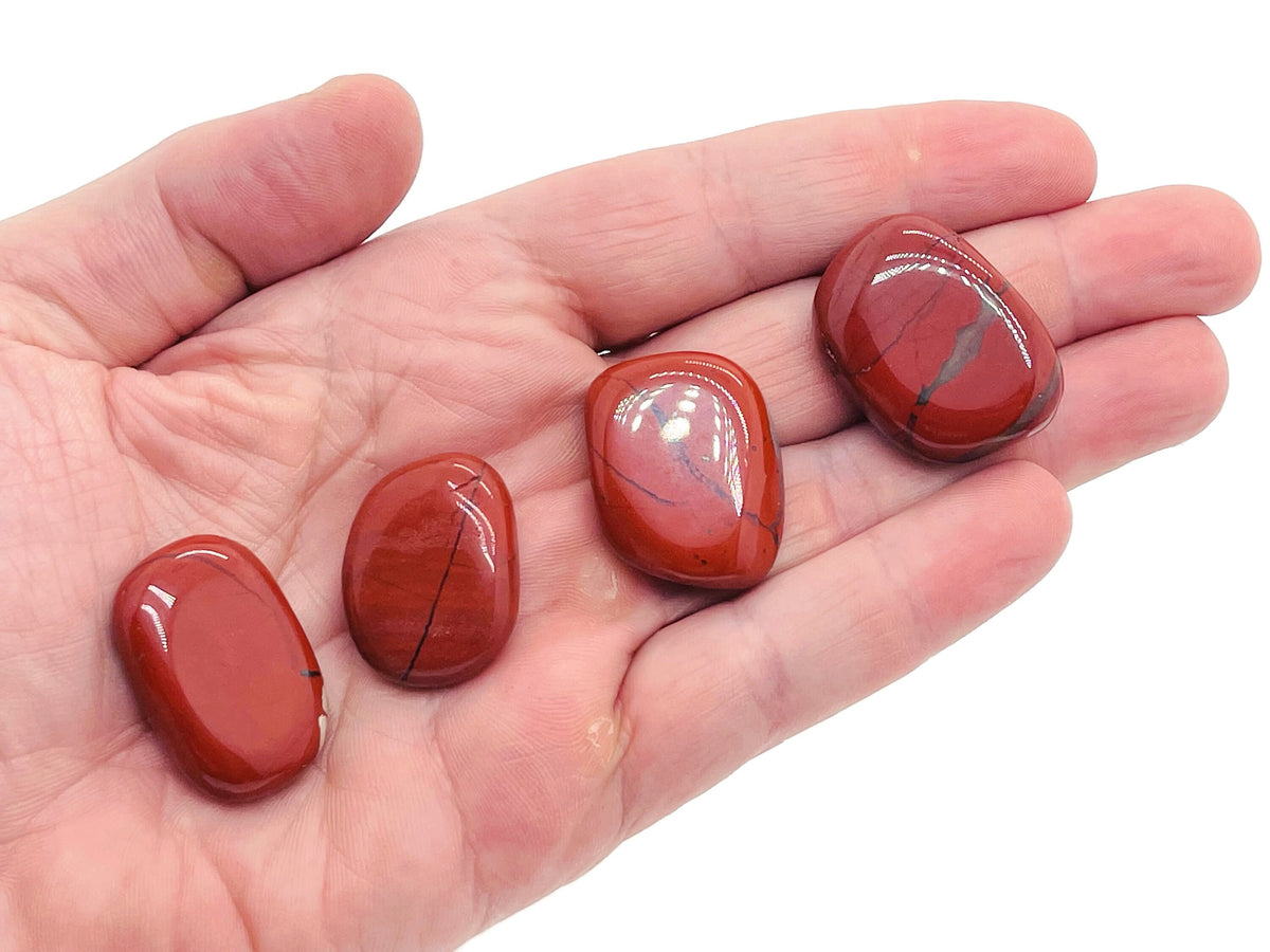Red Jasper flat gemstone slab from GemstoneGO, showcasing a polished red jasper crystal with natural banding and smooth surface.
