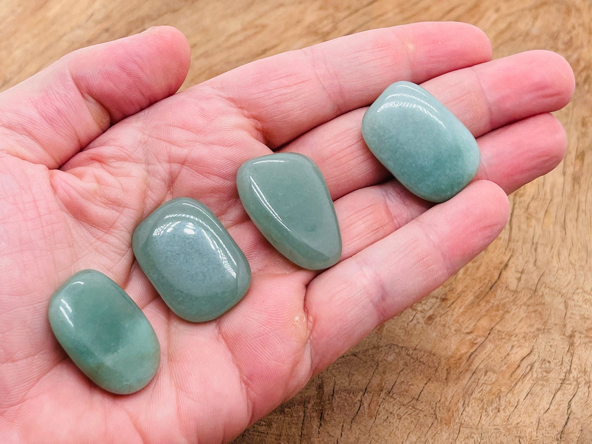 Aventurine flat gemstone slab from GemstoneGO, showcasing a smooth, polished green crystal with natural stone patterns.