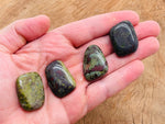Dragon Blood Jasper flat gemstone slab from GemstoneGO, showcasing rich red and brown patterns in a smooth, polished crystal slab.