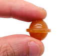 Orange Aventurine Saturn crystal carved mini planet gemstone, 18mm, detailed gemstone with a smooth, polished surface.
