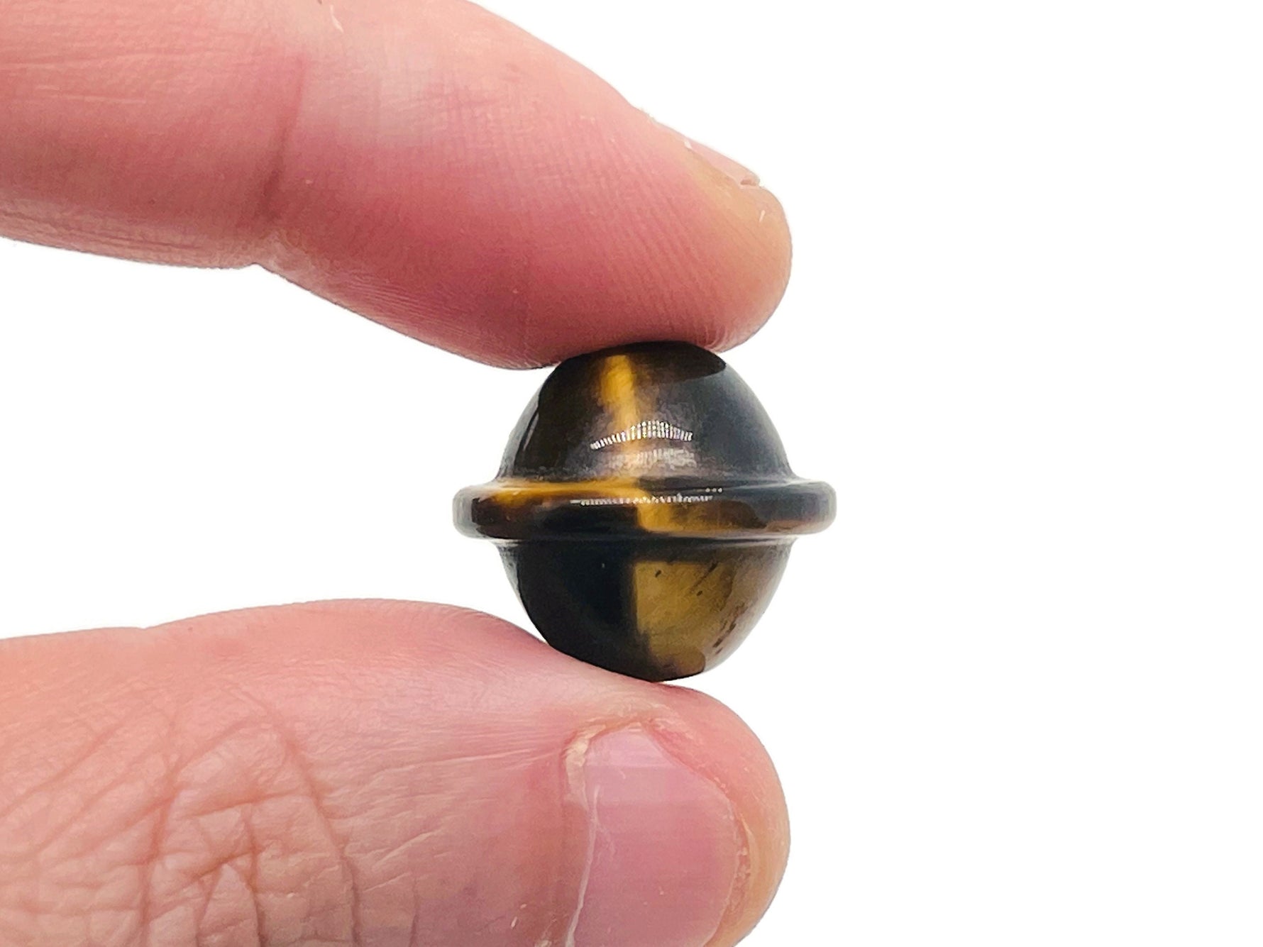 Mini Tiger Eye Saturn crystal carved gemstone, 18mm, showing detailed planetary design and rich golden-brown tiger eye stone.