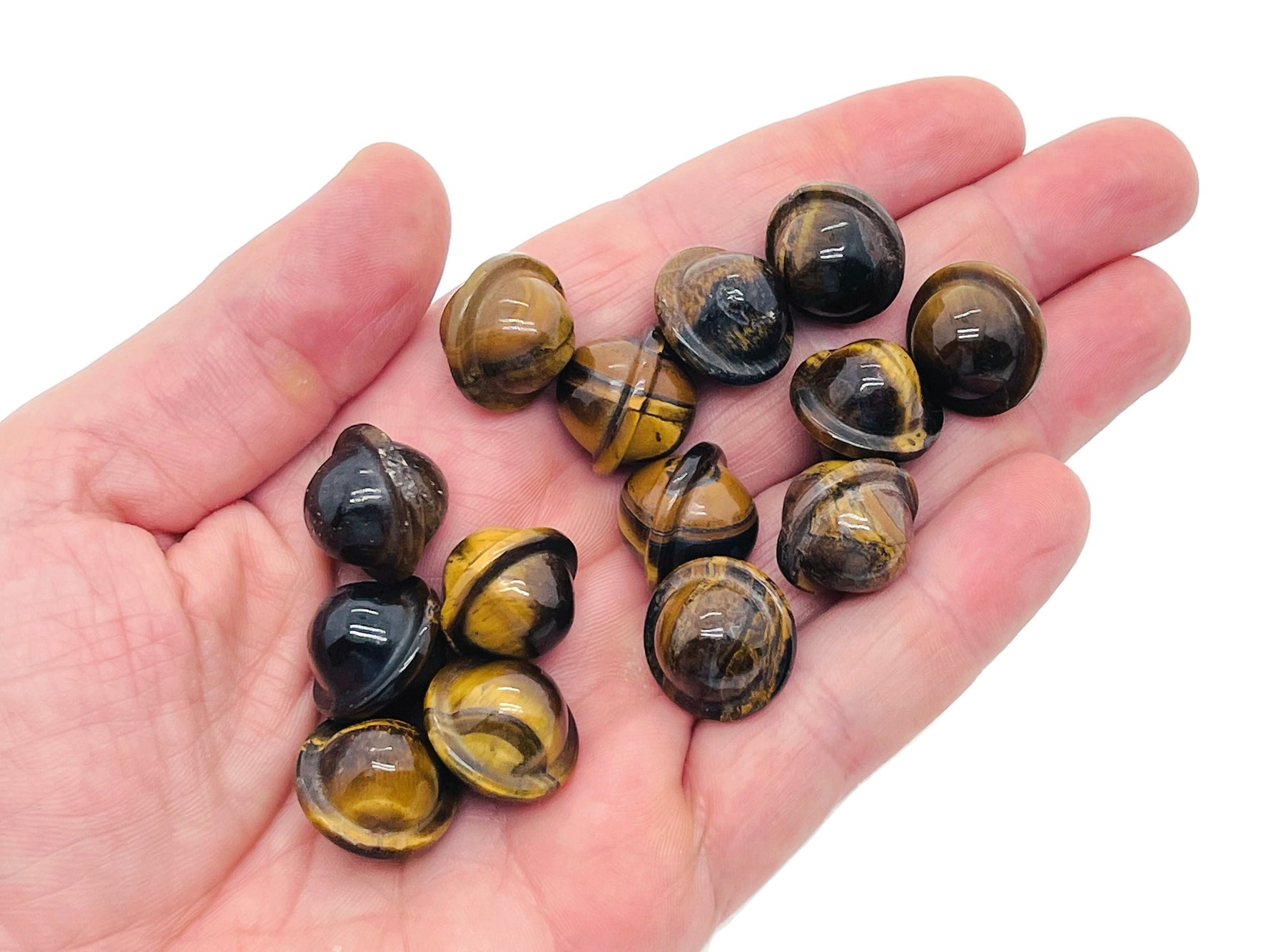 Mini Tiger Eye Saturn crystal carved as a planet gemstone, 18mm, showcasing warm amber hues and detailed planetary features.