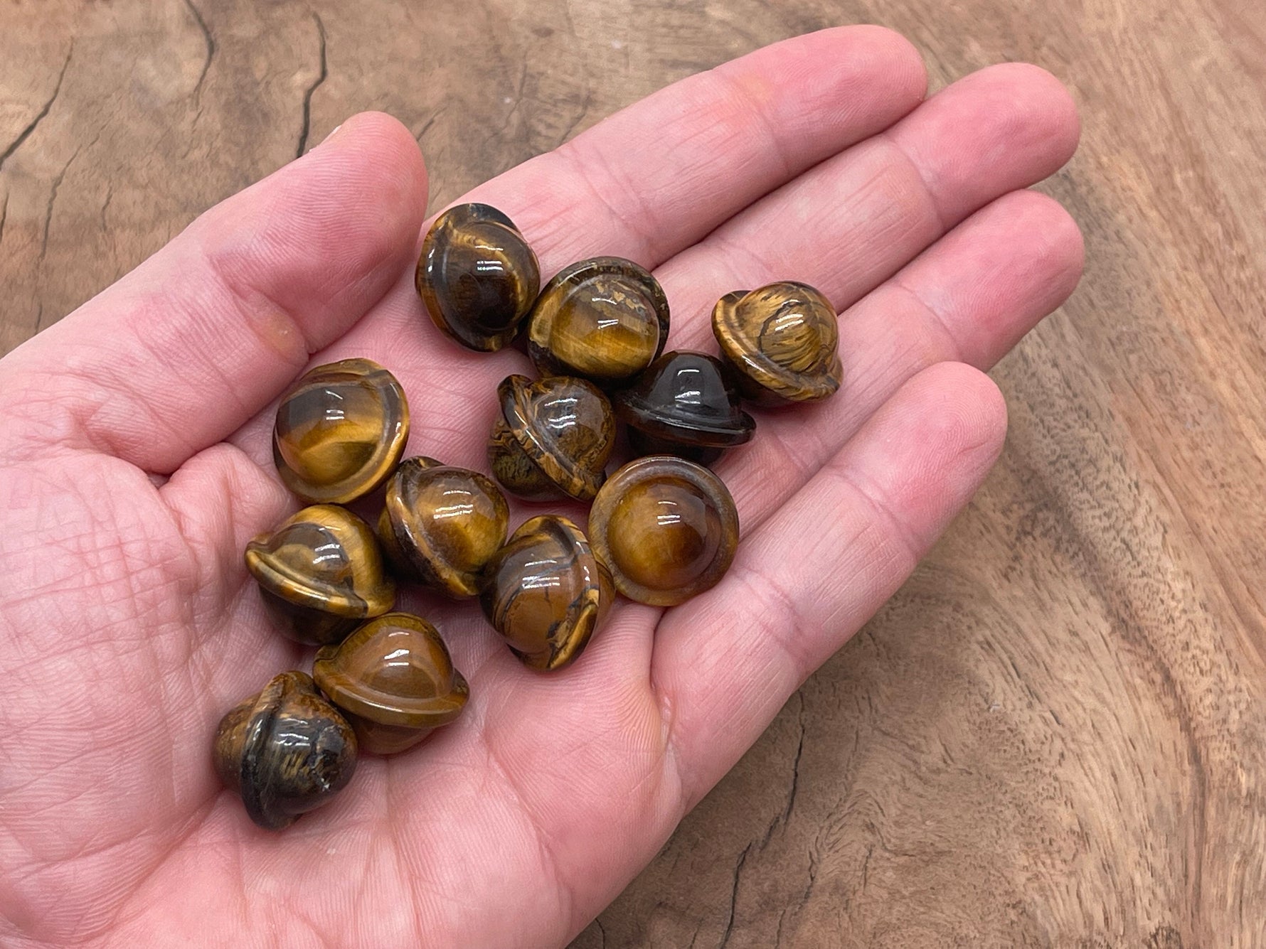 Mini Tiger Eye Saturn crystal gemstone carved as a planet, 18mm, showcasing warm brown and golden hues, from GemstoneGO.