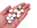 Mini 18mm Howlite Saturn crystal carved gemstone planet from GemstoneGO, featuring intricate planetary details and smooth polished surface.