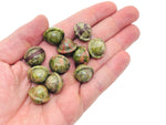 Unakite Saturn crystal carved gemstone, 18mm mini planet, from GemstoneGO, featuring detailed unakite gemstone carving of a planet shape.