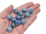 Blue aventurine Saturn-shaped gemstone, 18mm mini carved planet, from GemstoneGO, showcasing intricate planetary details.