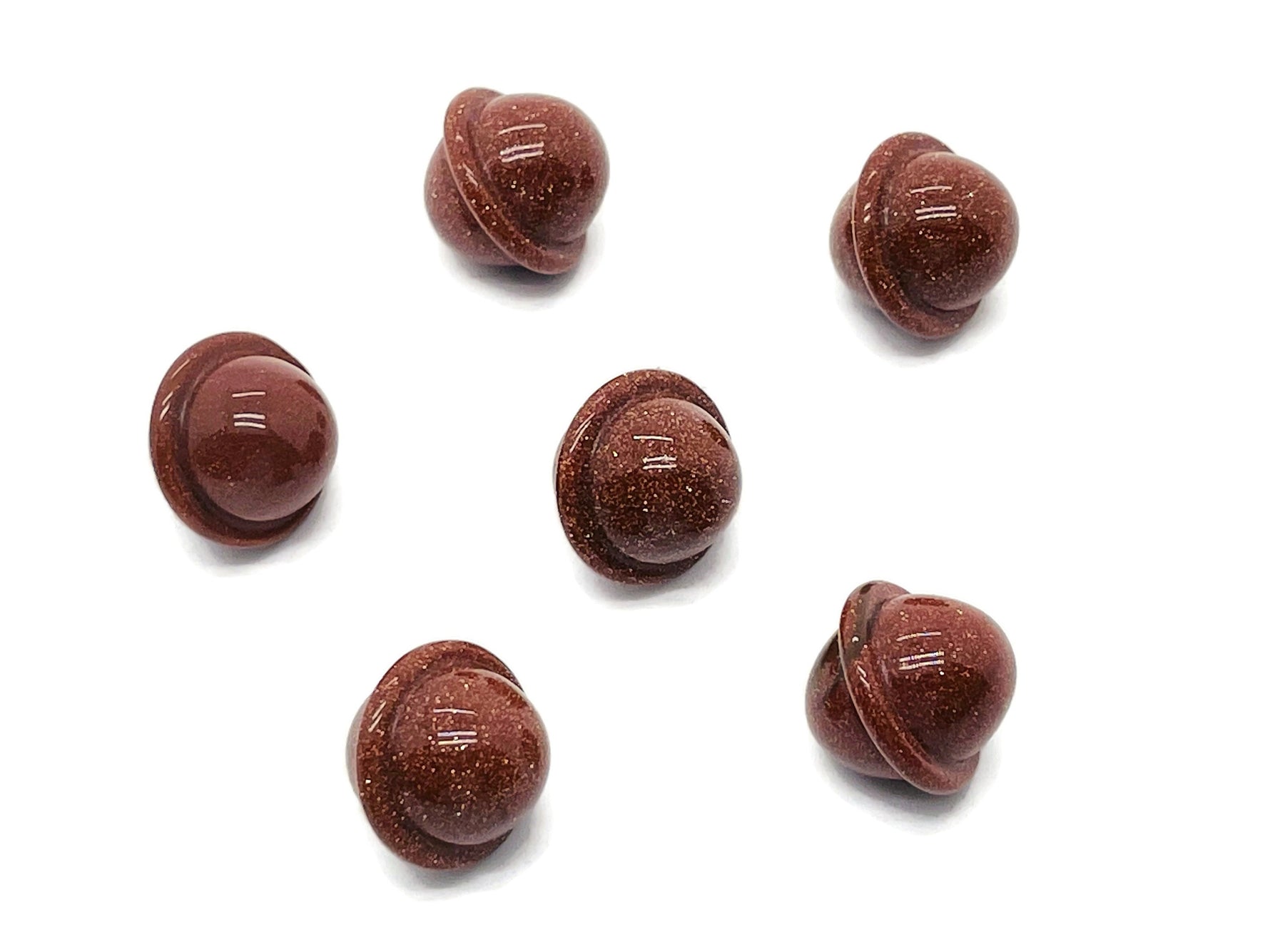 Goldstone Saturn crystal carved mini planet gemstone, 18mm, showcasing detailed planetary design and rich gold-brown hues.