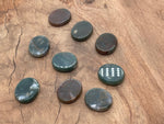 Moss agate flat gemstone slab from GemstoneGO, measuring 30x25x7 mm, showcasing natural green and brown moss-like patterns.