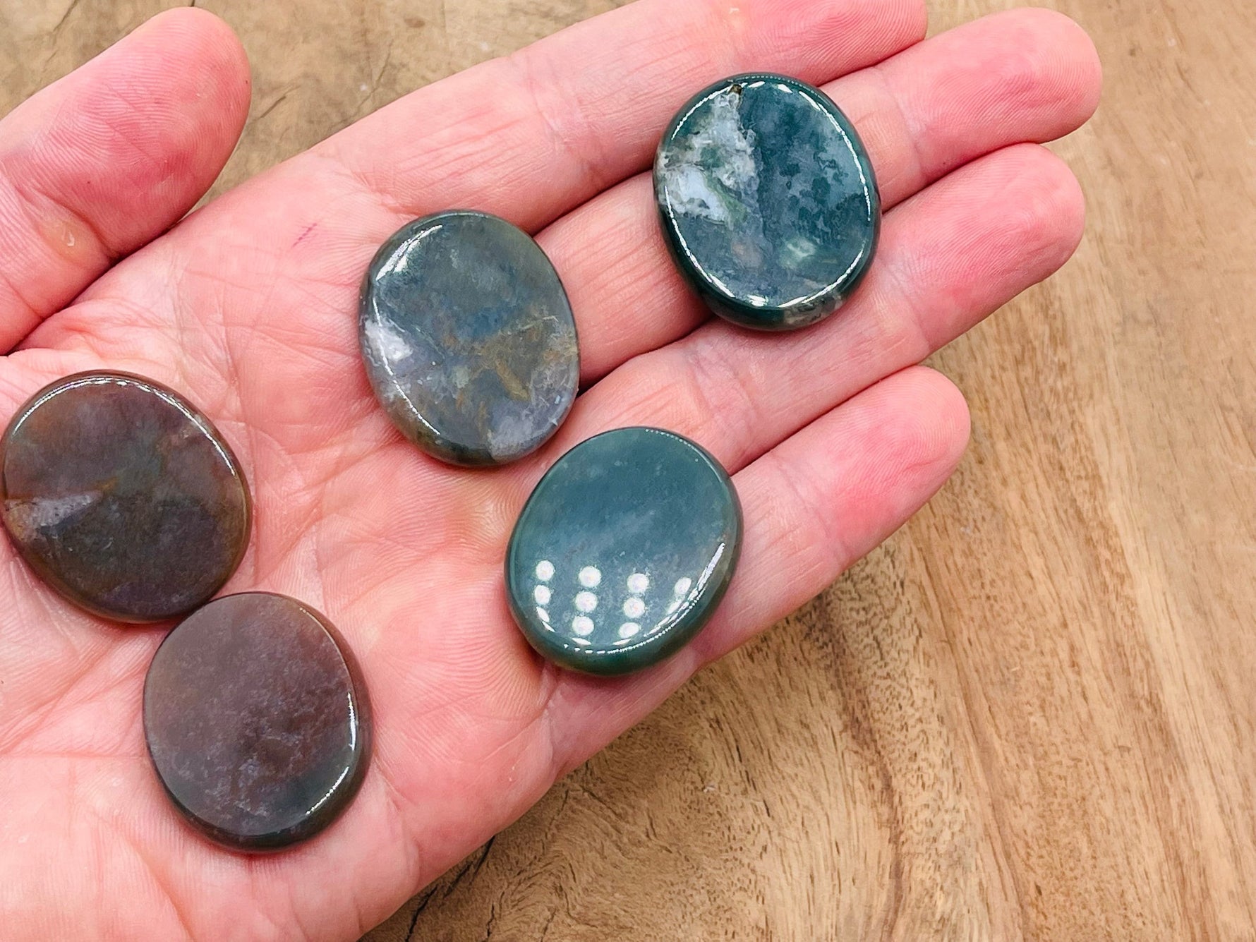 Moss agate flat gemstone slab with green and brown natural patterns, measuring 30x25x7 mm, from GemstoneGO.
