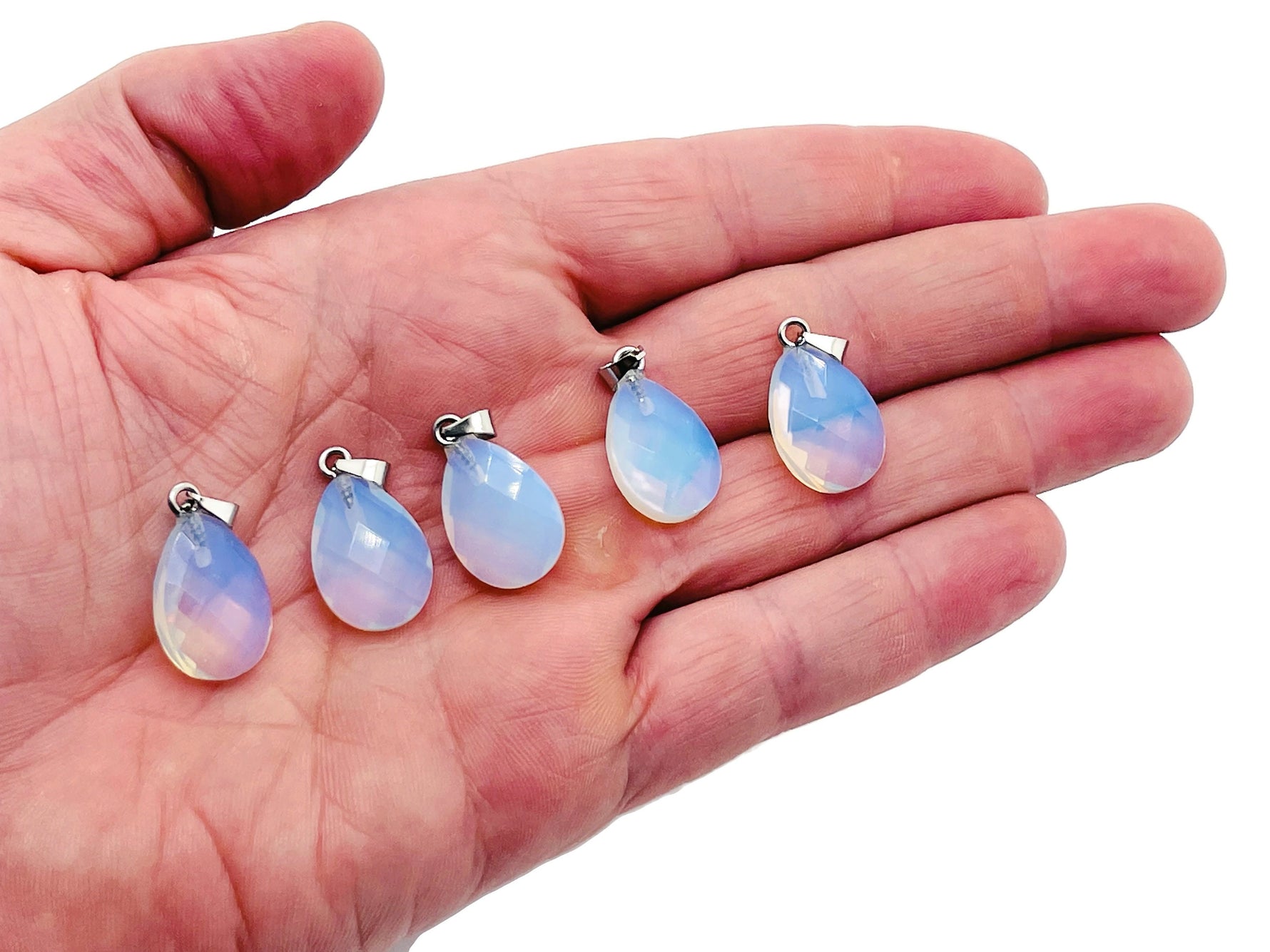 Opalite crystal pendant, 20mm gemstone for jewelry making, from GemstoneGO, shown on a neutral background.