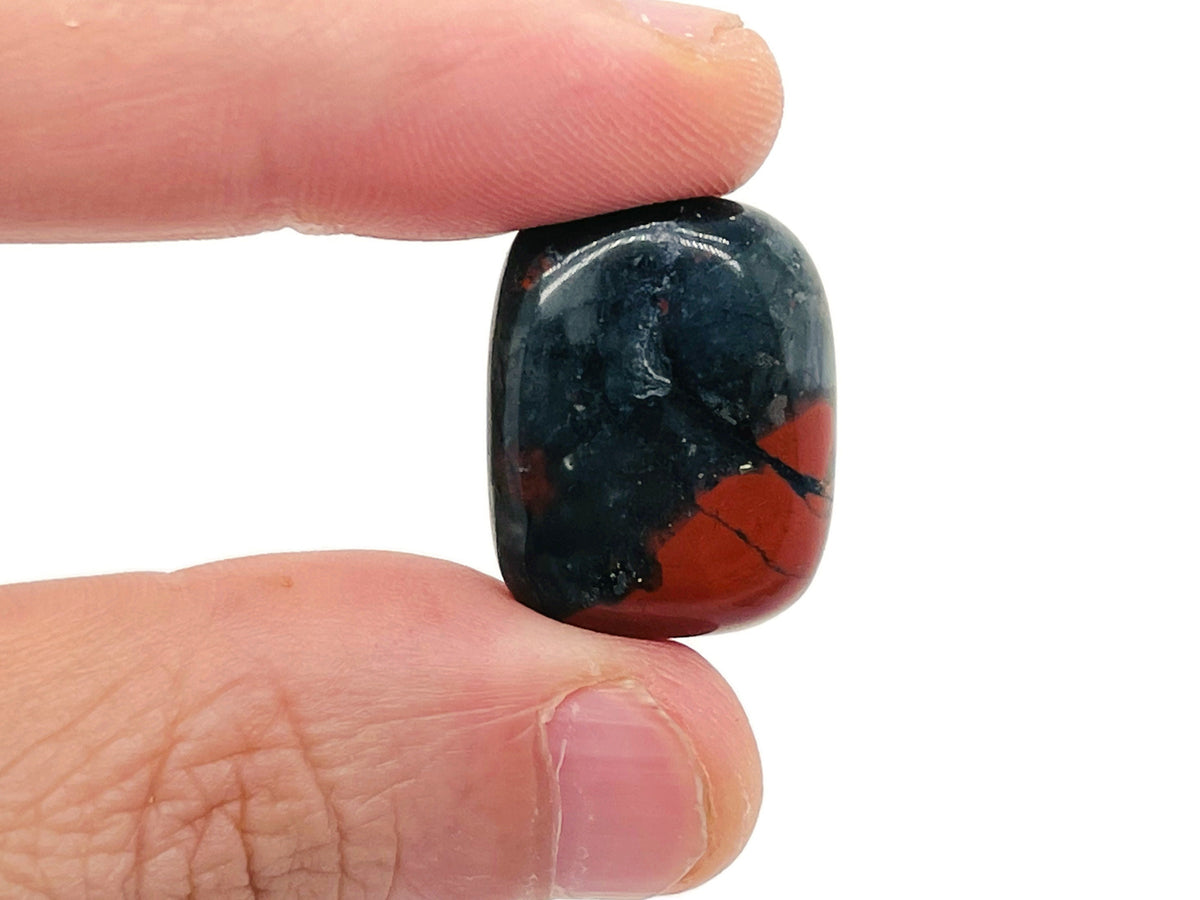 African Bloodstone tumbled gemstone from GemstoneGO showing deep green stone with red blood-like inclusions.