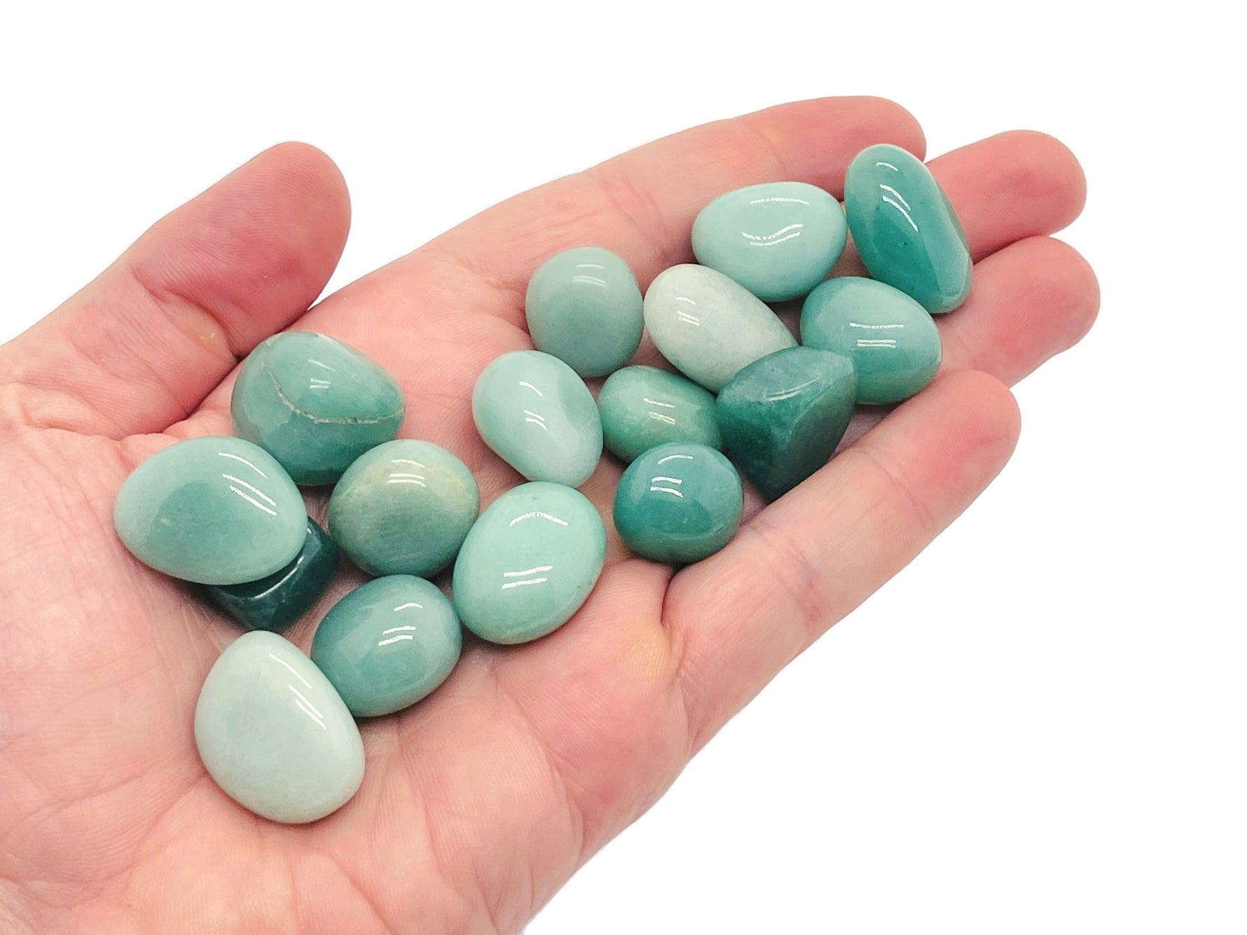 Aventurine tumbled gemstone from GemstoneGO showing smooth green polished stone with natural variations and shiny surface.