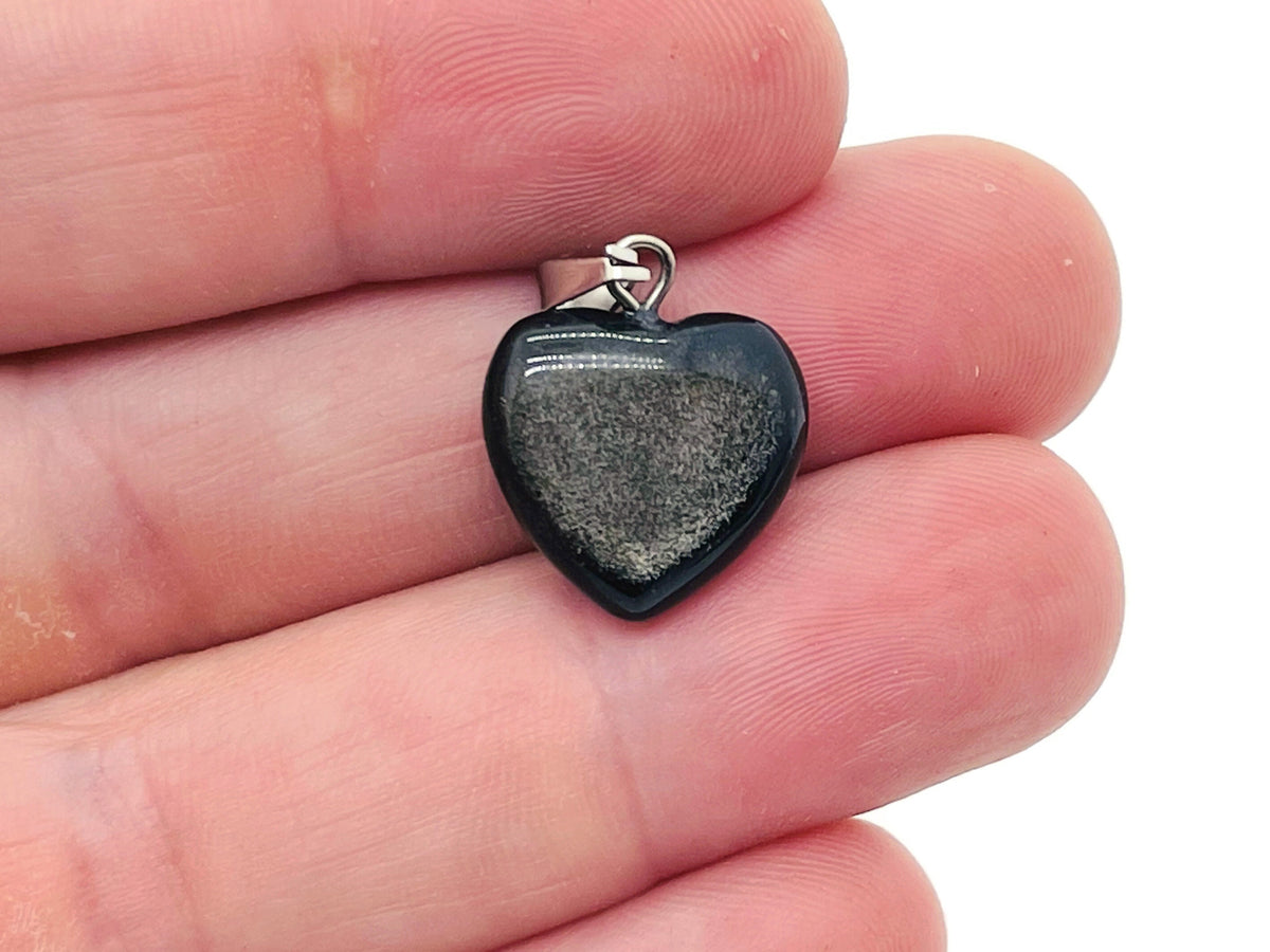 Mini obsidian heart pendant from GemstoneGO featuring a sleek black crystal design on a silver chain.
