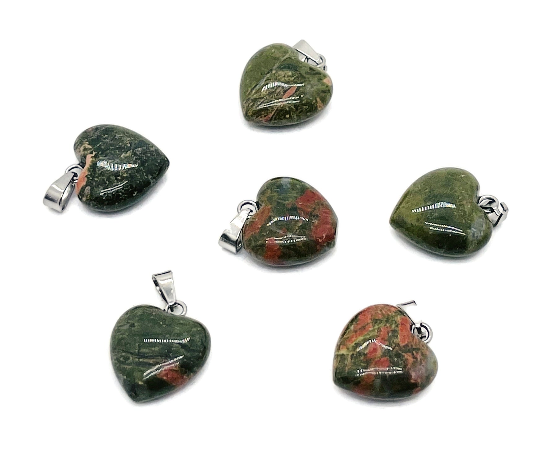 Unakite heart-shaped pendant with mini crystal charm from GemstoneGO, showcasing vibrant green and pink stone details.
