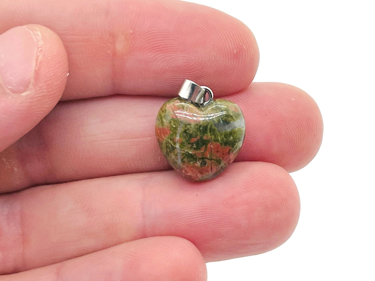 Unakite heart-shaped pendant from GemstoneGO featuring a mini crystal design, showcasing vibrant green and pink gemstone details.