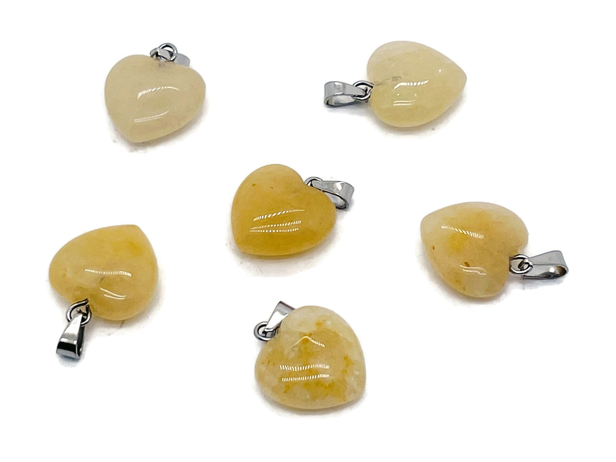 Yellow jade heart pendant with mini crystal accent from GemstoneGO, showcasing the polished yellow jade and delicate design.