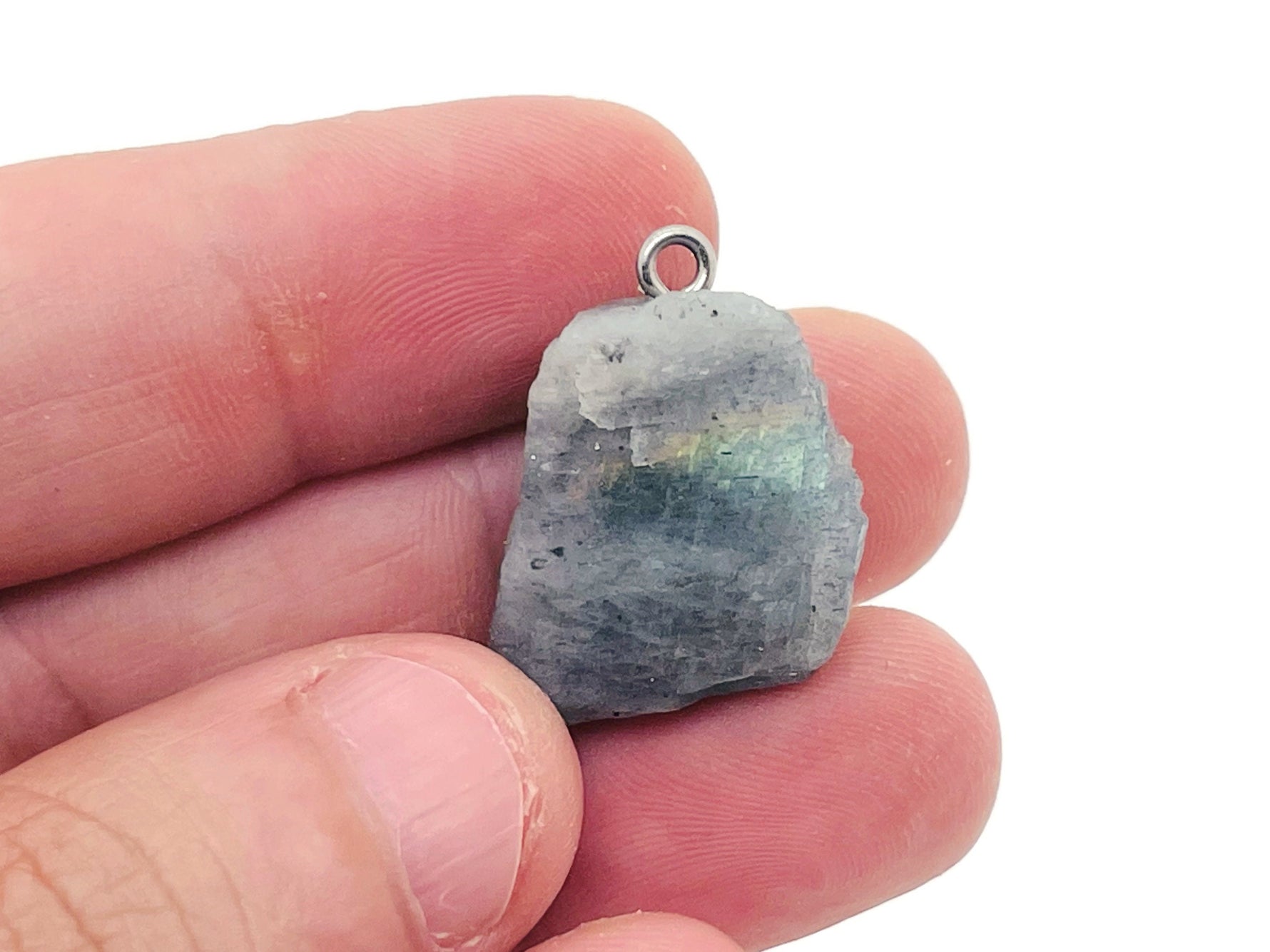 Labradorite crystal pendant from GemstoneGO featuring a polished, iridescent gemstone hanging on a silver chain.