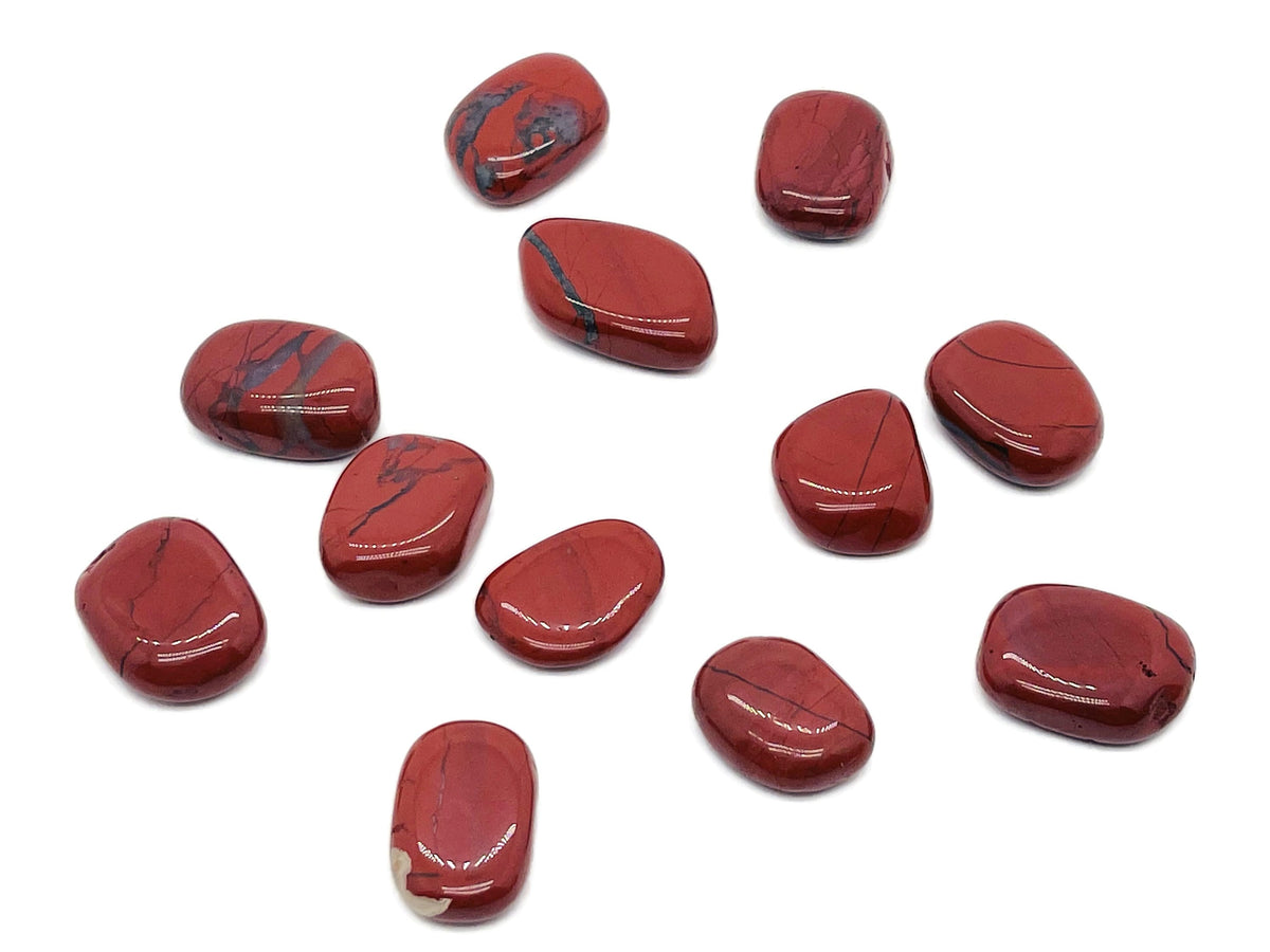 Red Jasper flat gemstone slab from GemstoneGO, showcasing a smooth, polished red jasper crystal with natural patterns and vibrant color.