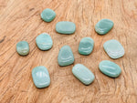 Aventurine flat gemstone slab from GemstoneGO, showcasing green, shimmering crystal with natural stone textures and polished surface.