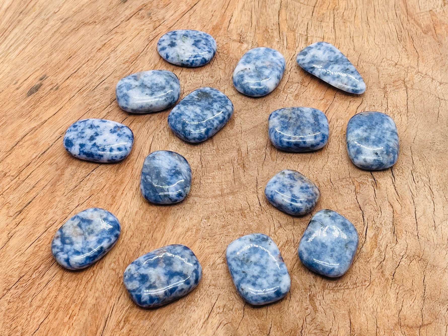Blue Spot Jasper flat gemstone slab from GemstoneGO, showing vibrant blue spots and natural crystal patterns on a polished surface.