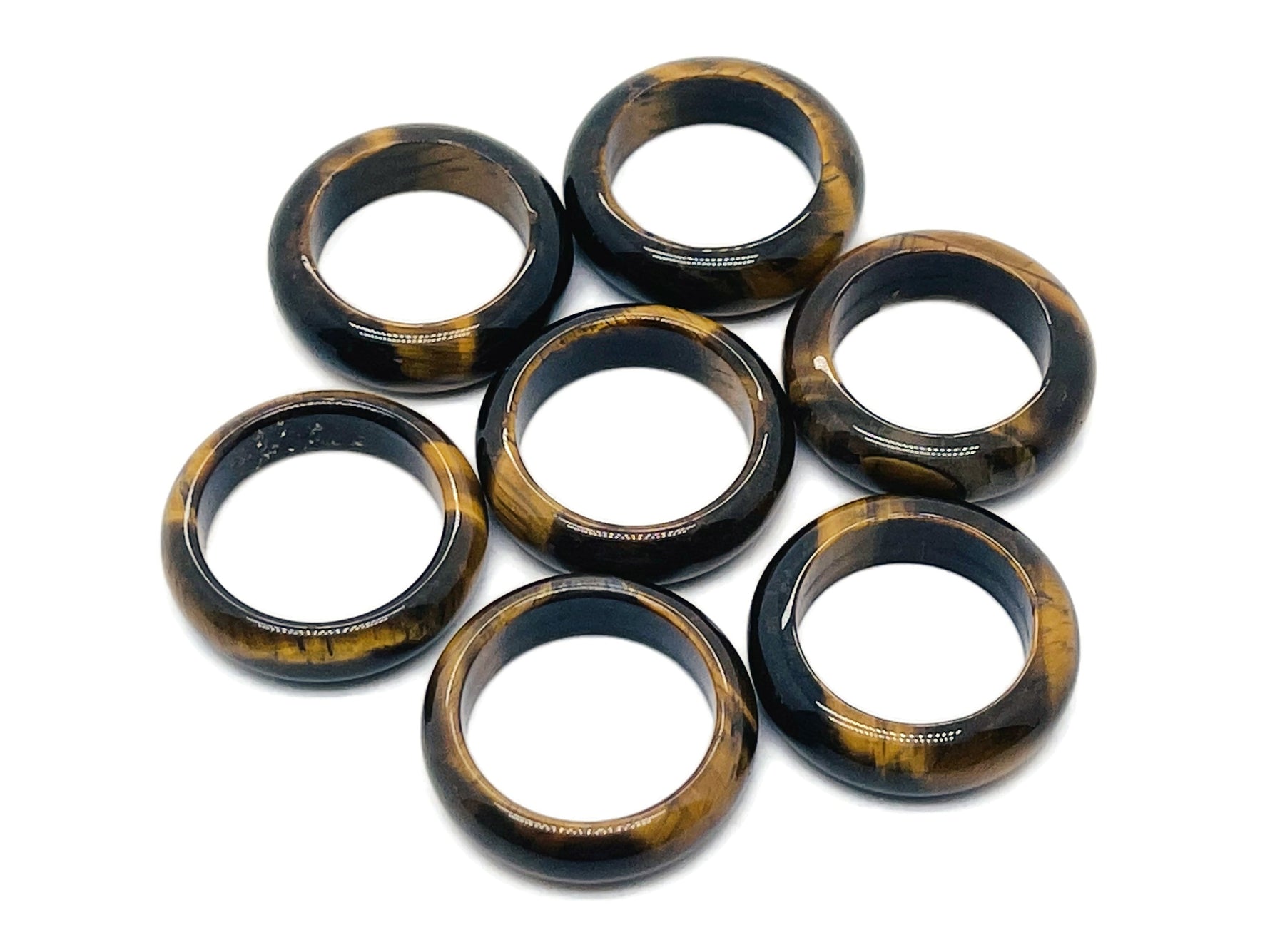 Tiger Eye crystal ring from GemstoneGO featuring a polished oval gemstone set in a silver band.