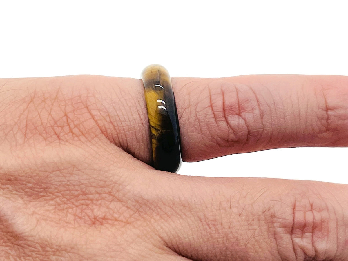 Tiger Eye Crystal Ring by GemstoneGO featuring a polished tiger eye stone set in a silver band.