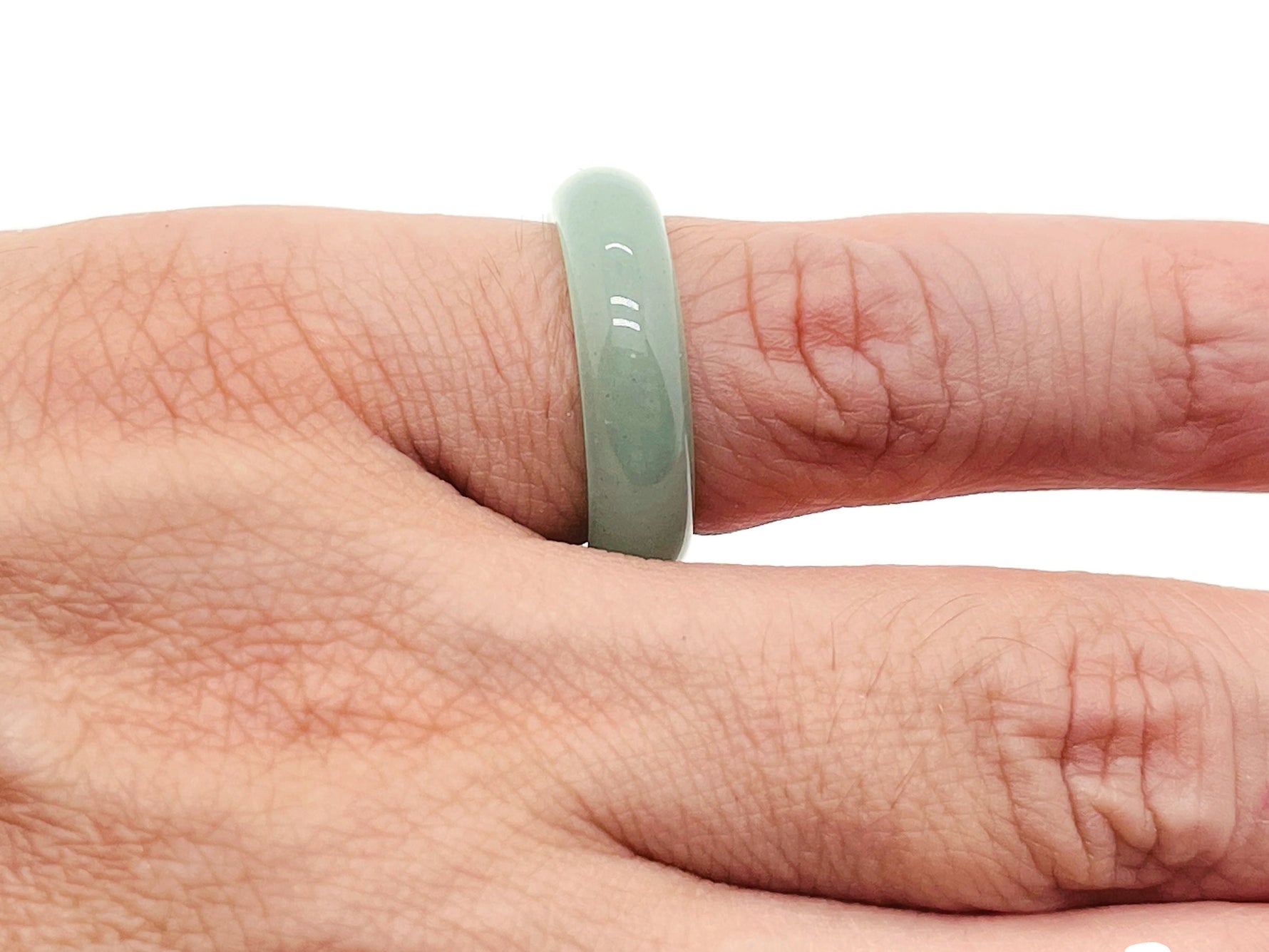 Aventurine crystal ring by GemstoneGO featuring a polished green aventurine stone set in a silver band.