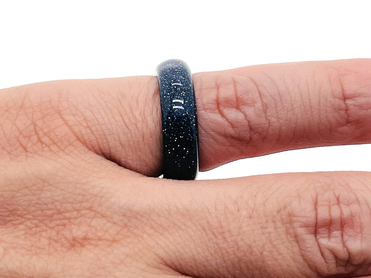 Blue Goldstone crystal ring by GemstoneGO featuring a sparkling blue and gold-flecked gemstone set in a silver band.