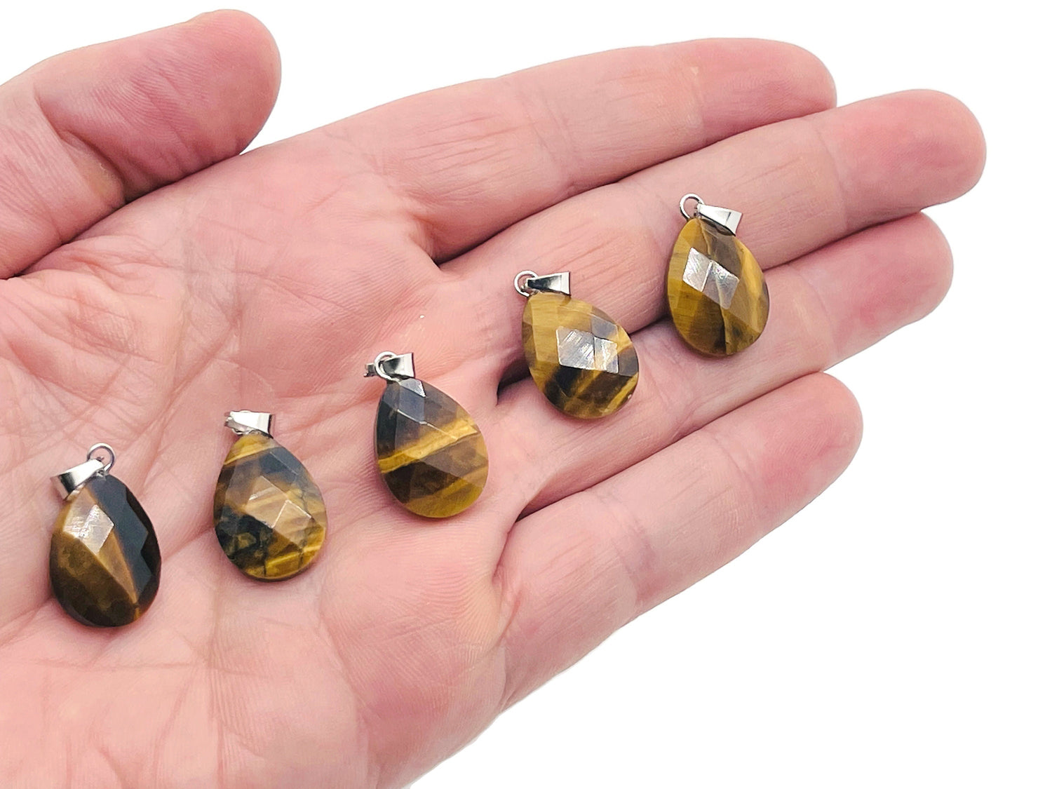 Tiger Eye crystal pendant, 20mm gemstone for jewelry making, from GemstoneGO, showing the polished, golden-brown stone.