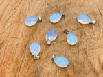 Opalite crystal pendant, 20mm gemstone for jewelry making, smooth oval shape with a soft glow, from GemstoneGO.
