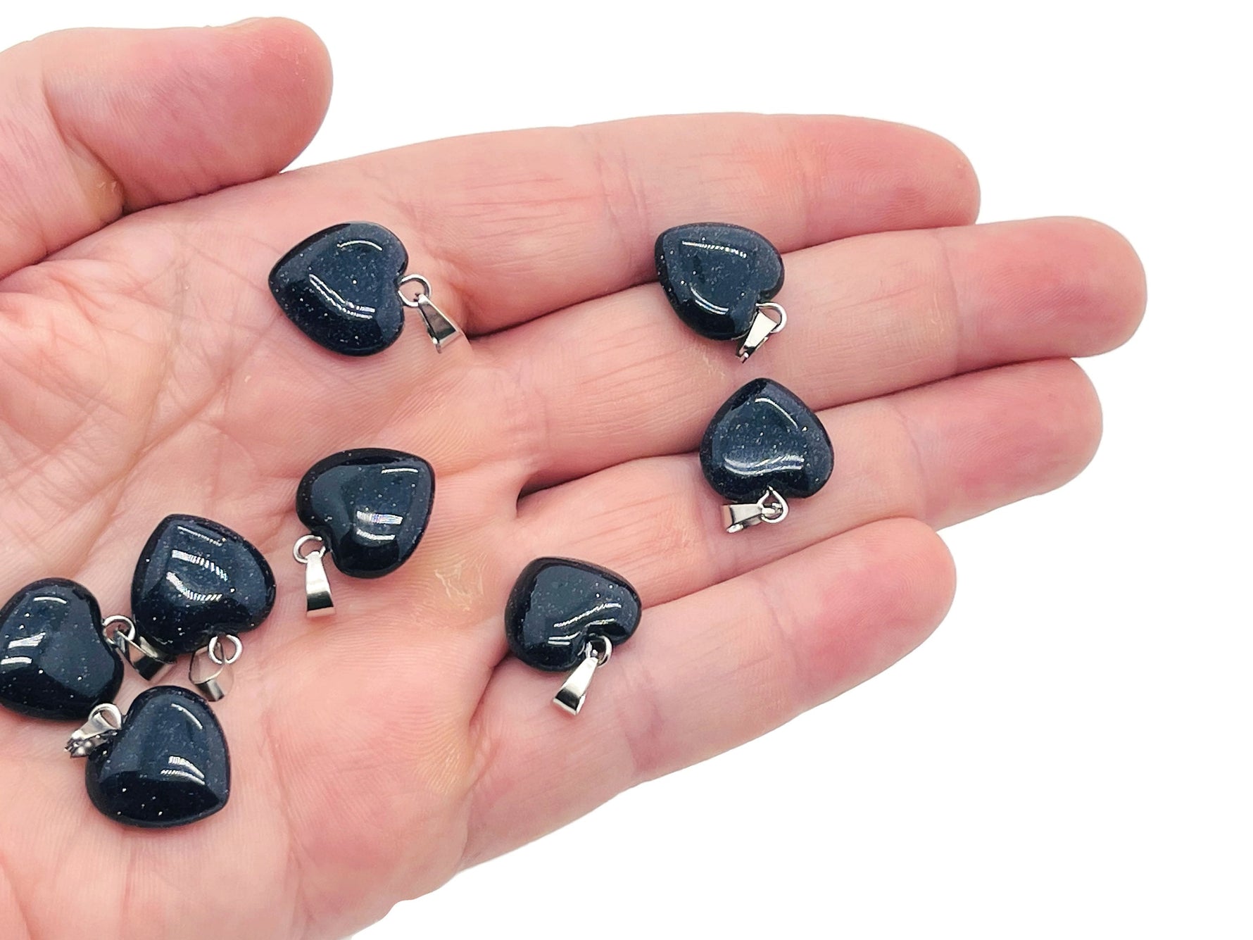 Blue GoldStone heart pendant with mini crystal details, showcasing a sparkling gemstone jewelry piece from GemstoneGO.