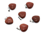 Goldstone heart pendant with mini crystal detail from GemstoneGO, showcasing a polished goldstone gemstone in a heart shape.