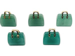Aventurine crystal purse carving gemstone pendant featuring a detailed handbag design, handcrafted by GemstoneGO.