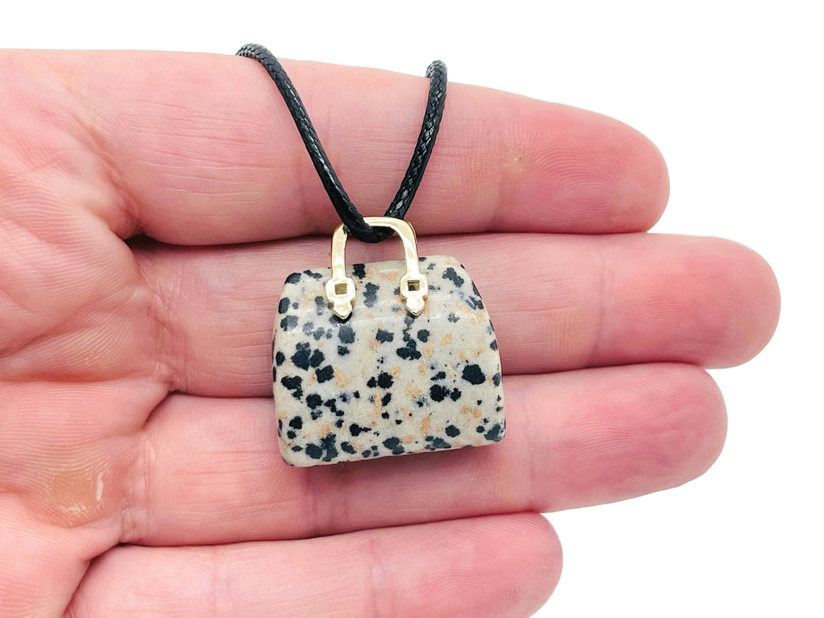 Dalmatian Jasper crystal handbag pendant featuring a detailed carved Dalmatian Jasper gemstone for jewelry or collection.