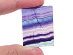 Fluorite slice slab gemstone from GemstoneGO showing vibrant purple, green, and blue hues with natural crystalline patterns.