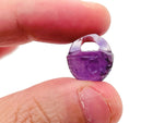 Fluorite garden basket carving gemstone by GemstoneGO, featuring intricate floral design and vibrant purple-green hues.