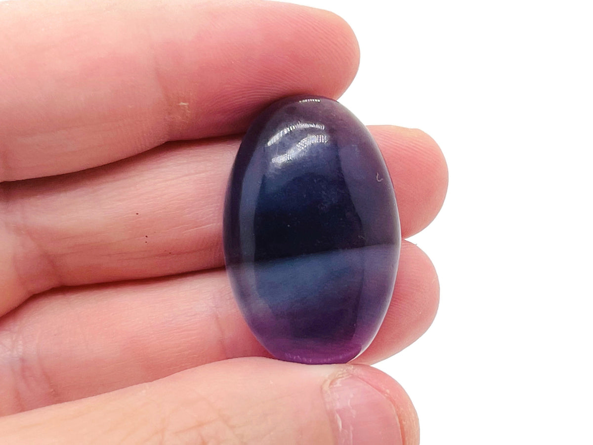 Fluorite flat gemstone slab crystal from GemstoneGO showing vibrant green and purple hues with polished surface.