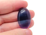 Fluorite flat gemstone slab crystal from GemstoneGO showing vibrant green and purple hues with polished surface.