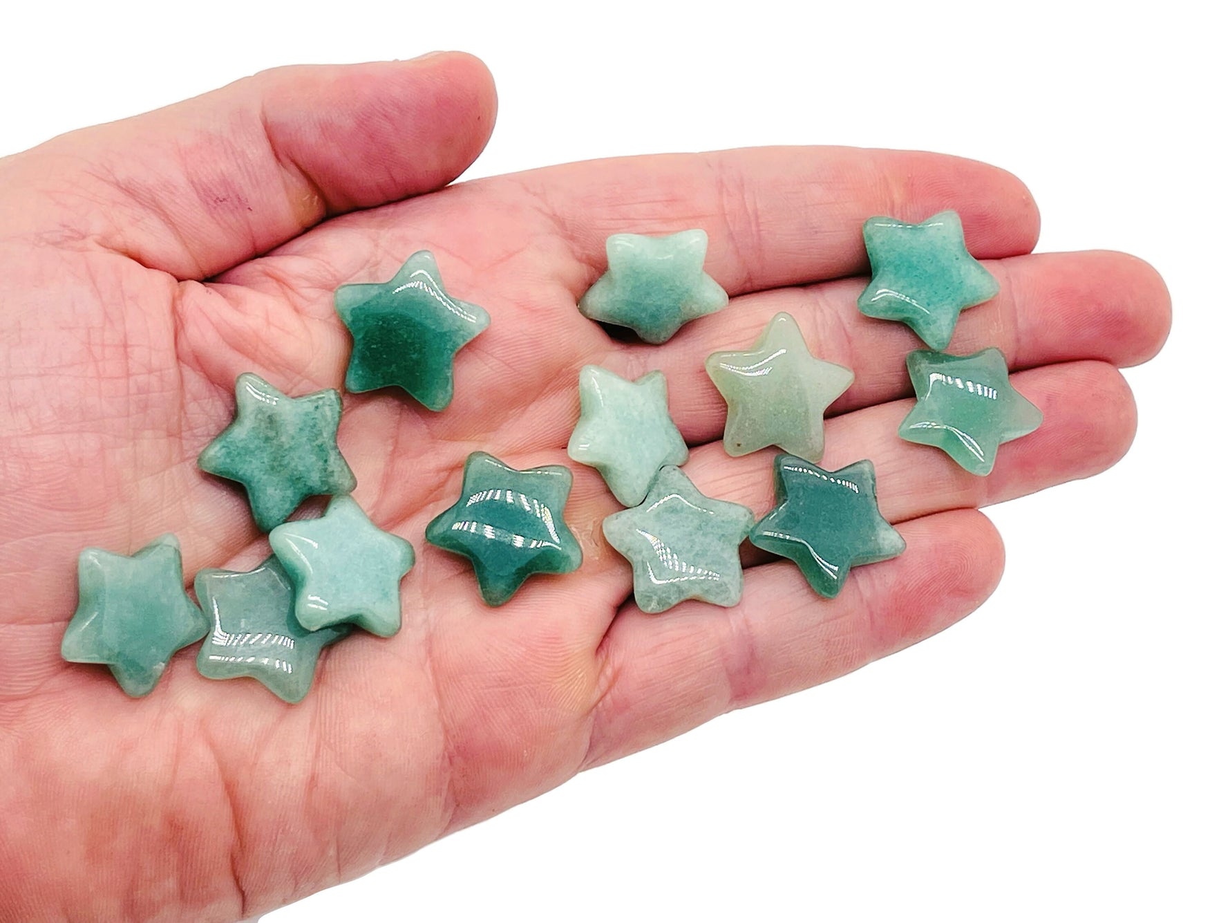 Small 2mm Aventurine Star gemstone from GemstoneGO, showcasing its green color and star-shaped inclusions.