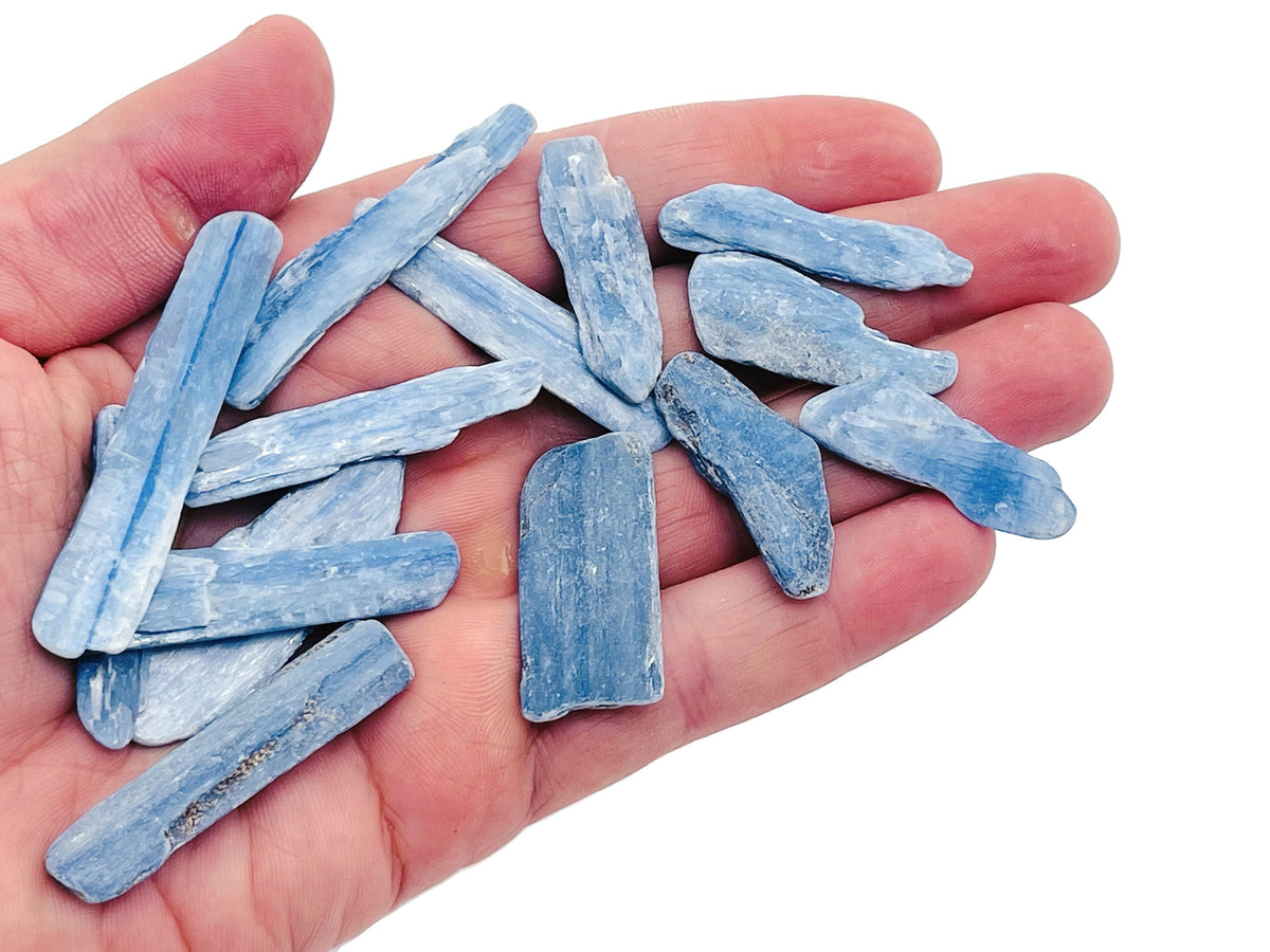 Raw Kyanite gemstone from GemstoneGO, showcasing deep blue crystal with natural rough texture and mineral formations.