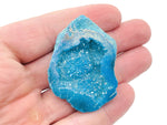 Blue Aura Oco Agate Geode raw crystal from GemstoneGO with vibrant blue hues and natural crystal formations.