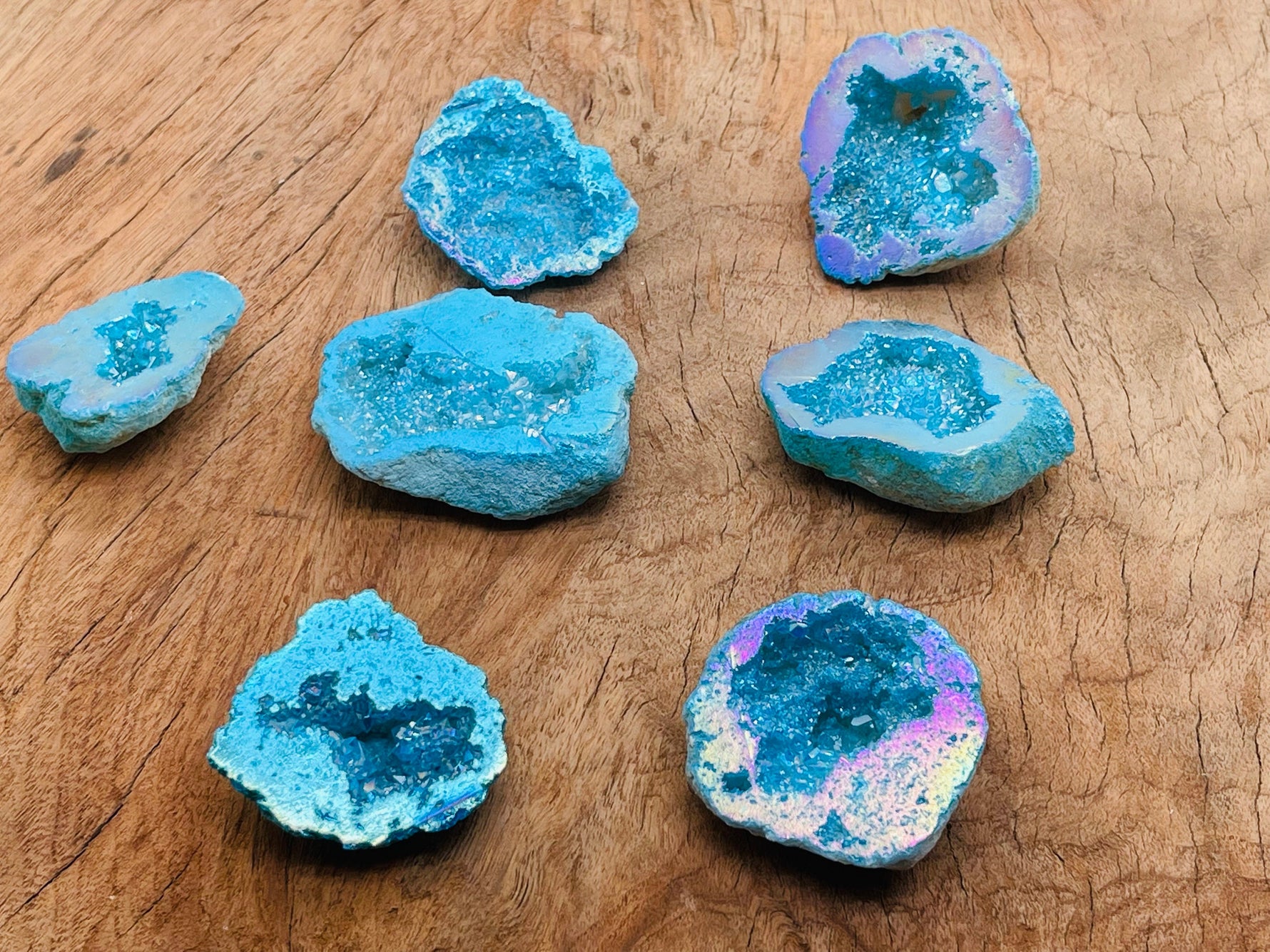 Blue Aura Oco Agate geode raw crystal from GemstoneGO, showing vibrant blue and natural crystal formations.
